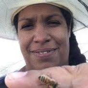 mel with bee on finger – Melanie Kirby